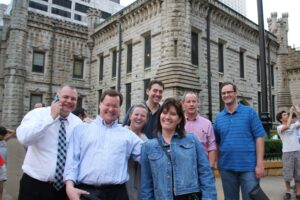 Dr. Anthony Simones, second from left, with Lee Ann Barnhardt, third from left. Photo by Margaret Allen.